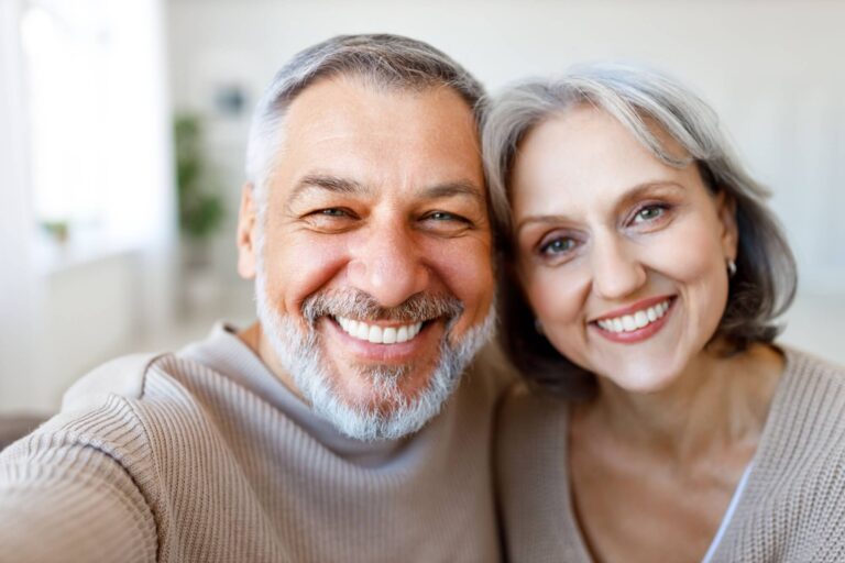 happy beautiful senior couple smiling