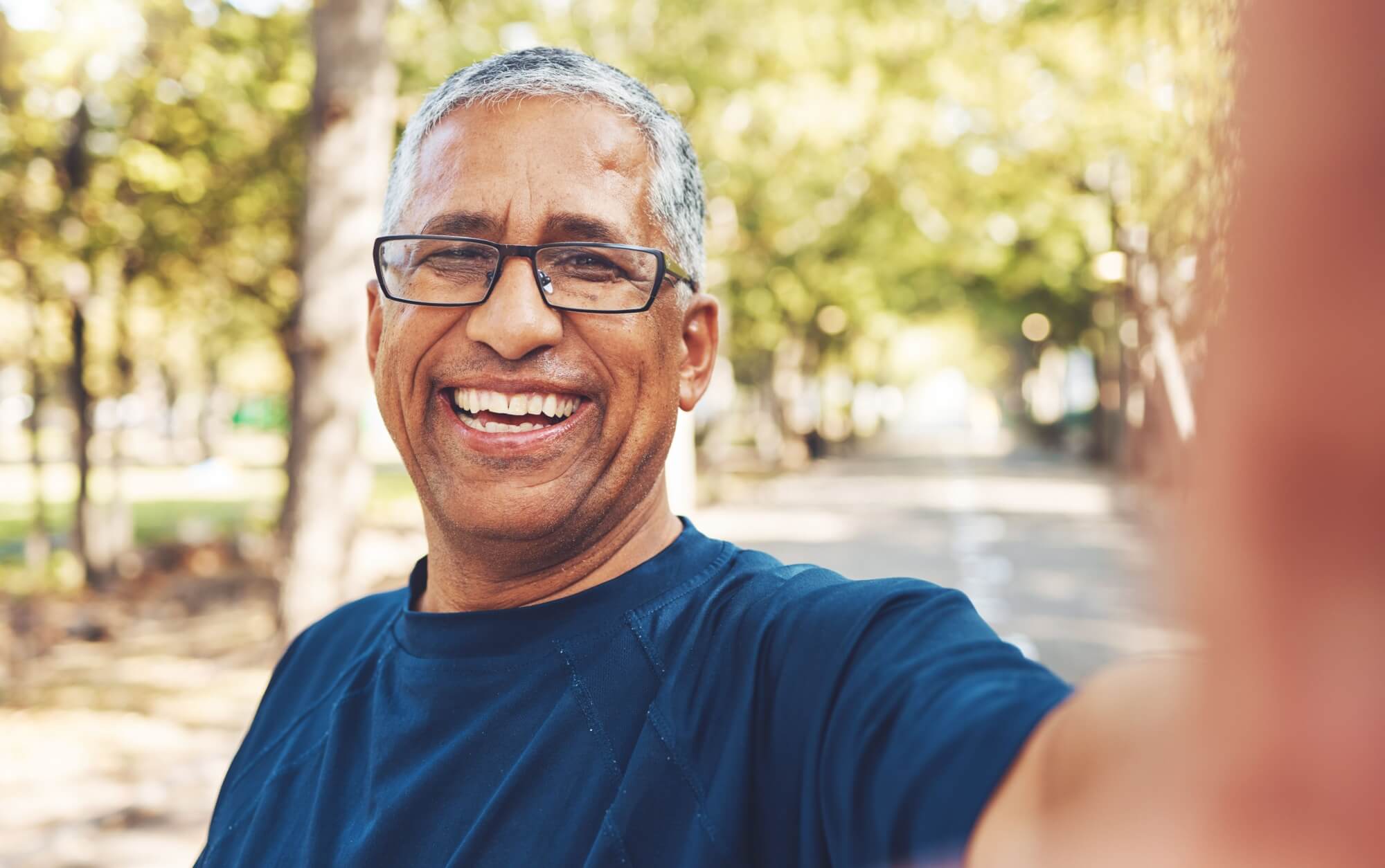 Fitness happy man taking selfie